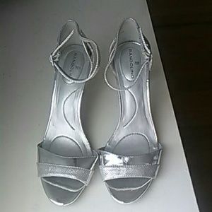 Silver open toed shoes